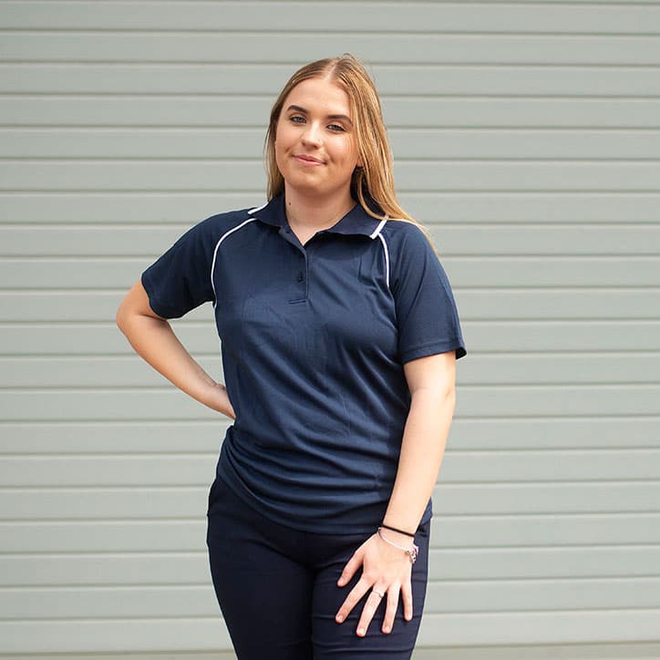 Front View of lady wearing the Ladies Bamboo Cotton Polo in Navy by Southern Cross Workwear