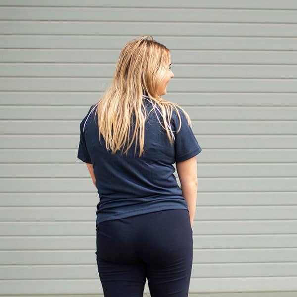 Back View of lady wearing the Ladies Bamboo Cotton Polo in Navy by Southern Cross Workwear